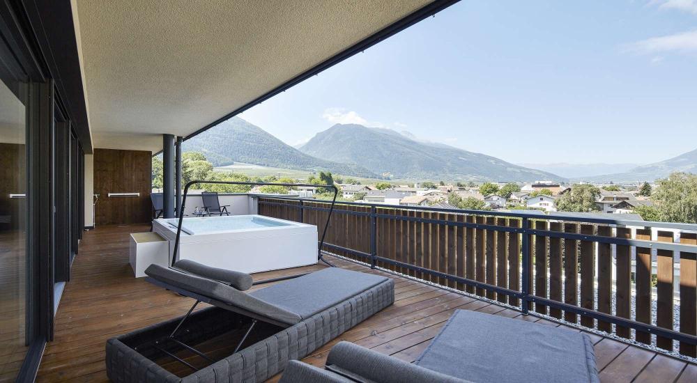 Whirlpool auf der Terrasse des Zimmers Whirlpool auf der Zimmerterrasse